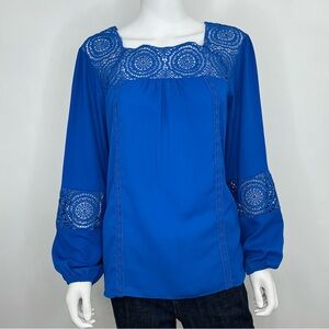 Valerie Steven’s women’s blue blouse